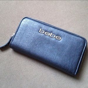 Black Bebe purse wallet with the zipper